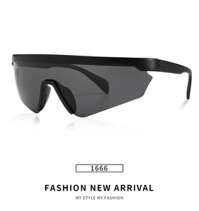 Detail of classic black polarized sports sunglasses with futuristic one-piece shield lens