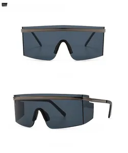 Front and 45-degree side view of oversized wrap-around sunglasses in gun black gray finish