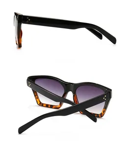 Detailed side and back view of black and tortoise shell sunglasses with purple gradient lenses