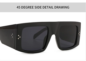 Macro view of retro square black sunglasses with iconic three-point silver rivets