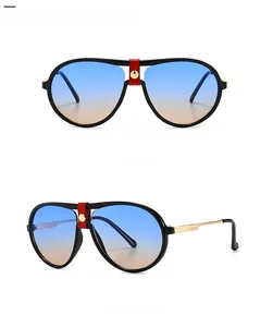 Detail view of aviator sunglasses in black blue tea with a gradient lens and metal frame