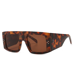 Classic tortoise shell square sunglasses with retro oversized frame and silver rivet details