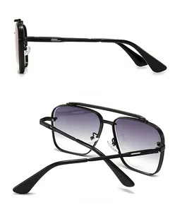 Detail view of modern square sunglasses with black double-bridge frame and purple gradient lens