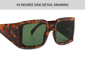 Detailweergave van grote D-frame schildpad zonnebril met strass steentjes op 45 graden