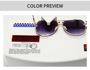 Detail view of aviator sunglasses showing UV400 protection test on professional device