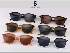 Flat lay display of 6 retro oversized rivet sunglasses in various stylish colors