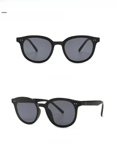 Detail of vintage rivets and hinges on classic black square-frame sunglasses
