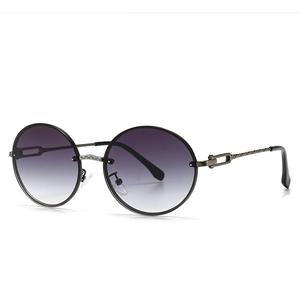 Lunettes de soleil rondes rétro avec monture en métal et verres dégradés violets