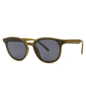 Classic oversized sunglasses in transparent olive green resin with rivet details