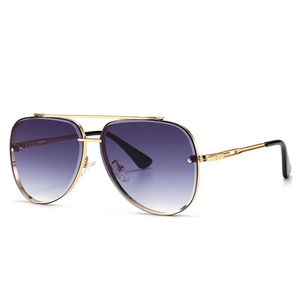 Classic aviator sunglasses with gold metal frame and purple gradient lenses on white
