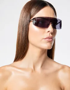 Macro detail of high-quality sunglasses featuring the metallic PP logo on side temple