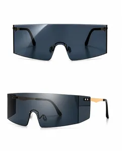 Detailed front and side views of gold ash oversized wrap-around shield sunglasses
