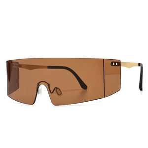 Oversize amber flat top sunglasses with golden metal temples for a modern trendy look
