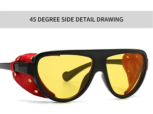 Détail de lunettes steampunk rétro avec protections latérales en cuir rouge et verres jaunes