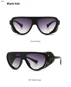 Détail des lunettes pilote avec protections en cuir noir et rivets dorés