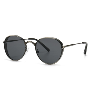 Lunettes de soleil punk rétro modernes avec monture en métal gris foncé et verres ronds