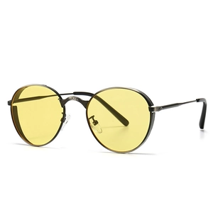 Lunettes de soleil punk vintage avec verres ronds jaunes et monture en métal bronze