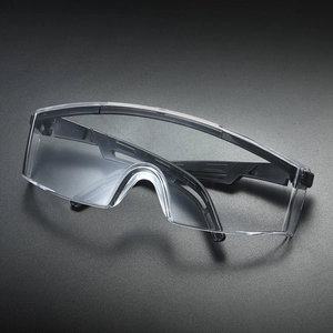 Close-up of clear anti-fog safety goggles with durable black frames and side shields
