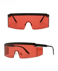 Close-up of oversized flat top sunglasses with red lenses and black frame in dual view