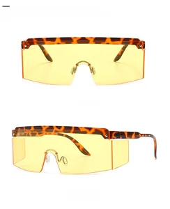 Detailed views of leopard print flat top sunglasses with yellow lenses from multiple angles