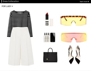 Flat lay of square flat top sunglasses with striped top and elegant accessories