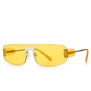 Lunettes de soleil sans monture rétro Y2K avec verres jaunes et détails en métal argenté