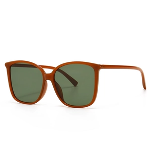 Modern retro oversized square sunglasses in caramel brown frame with olive green lenses