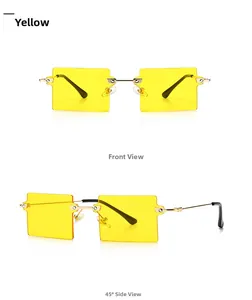 Detail view of rimless rectangular sunglasses with yellow lenses and golden metal temples