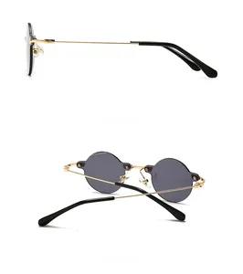 Detail view of vintage gold metal frame sunglasses with side and back perspectives