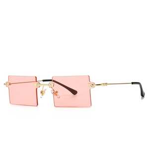 Retro square rimless sunglasses with pink lenses and gold metal frames for women