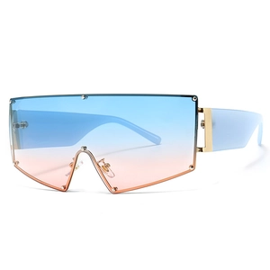 Lunettes de soleil oversize sans monture, verres dégradés bleu-rose et rivets dorés