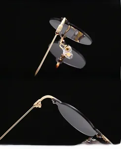 Detail view of reinforced hinges and gold metal temples on retro square sunglasses