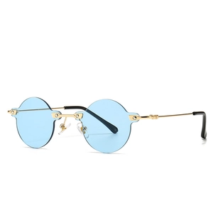 Modern retro gold frame sunglasses with light blue round lenses for street style fashion