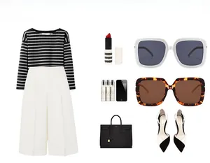 Chic women outfit featuring oversized square sunglasses and striped knitwear set