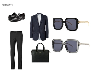 Close-up of stylish square sunglasses with unique gold metal chain temples for men