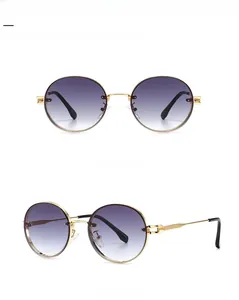 Vorder- und Seitenansicht der Vintage Oval-Sonnenbrille mit Goldrahmen und Grauverlauf