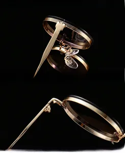 Makro-Detail hochwertiger Metallscharniere und UV-Schutzgläser der ovalen Sonnenbrille