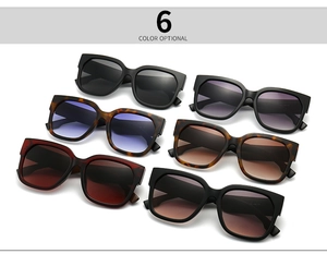 Six different color options of wide frame sunglasses showing lenses and frame details