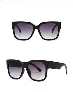 Front and 45-degree angle view of wide frame sunglasses with black double grey gradient lens