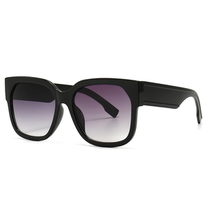 Modern wide-leg square sunglasses with black frames and gradient purple-gray lenses
