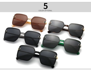 Detail showing five assorted square polarized sunglasses with gold hinge metal hardware