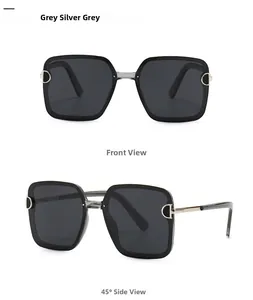 Detail showing the metal D-shaped logo on gray square polarized sunglasses