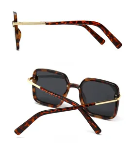 Side and back view of tortoiseshell square sunglasses with gold metal temples