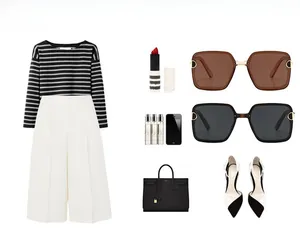 Flat lay of square polarized sunglasses styled with fashion apparel and accessories