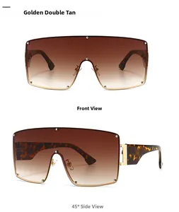 Close-up of golden double tan shield sunglasses with tortoiseshell temples and metal detail