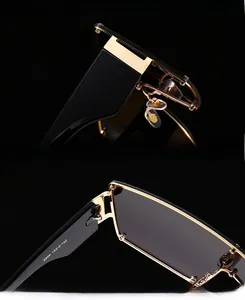 Detail of punk sunglasses showing metallic hinges, rivets, and UV protection labeling