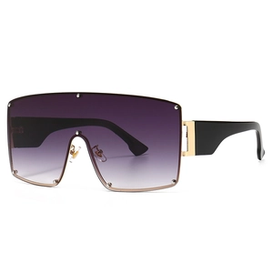 Punk style oversized sunglasses with purple gradient lenses and metal rivet details