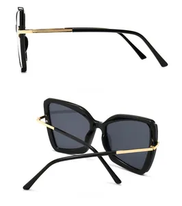 Seiten- und Rückansicht der Schmetterlings-Sonnenbrille mit goldfarbenen Bügeln