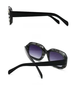 Detail view showing side and back angles of vintage zebra leopard print square sunglasses