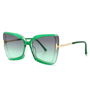 Retro Oversize-Schmetterlings-Sonnenbrille mit grünem Rahmen und Goldbügeln
